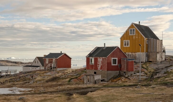 De foto is gemaakt in juni in Groenland in het plaatsje Ilimanaq. Jan Brouwer: ,,Een bijzondere bestemming. De foto toont door wind verweerde huisjes in een dorpje met slechts 40 inwoners.