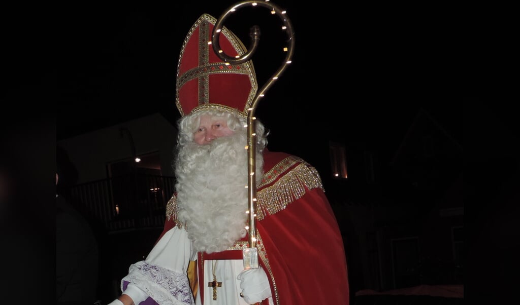Sinterklaas met verlichte staf
