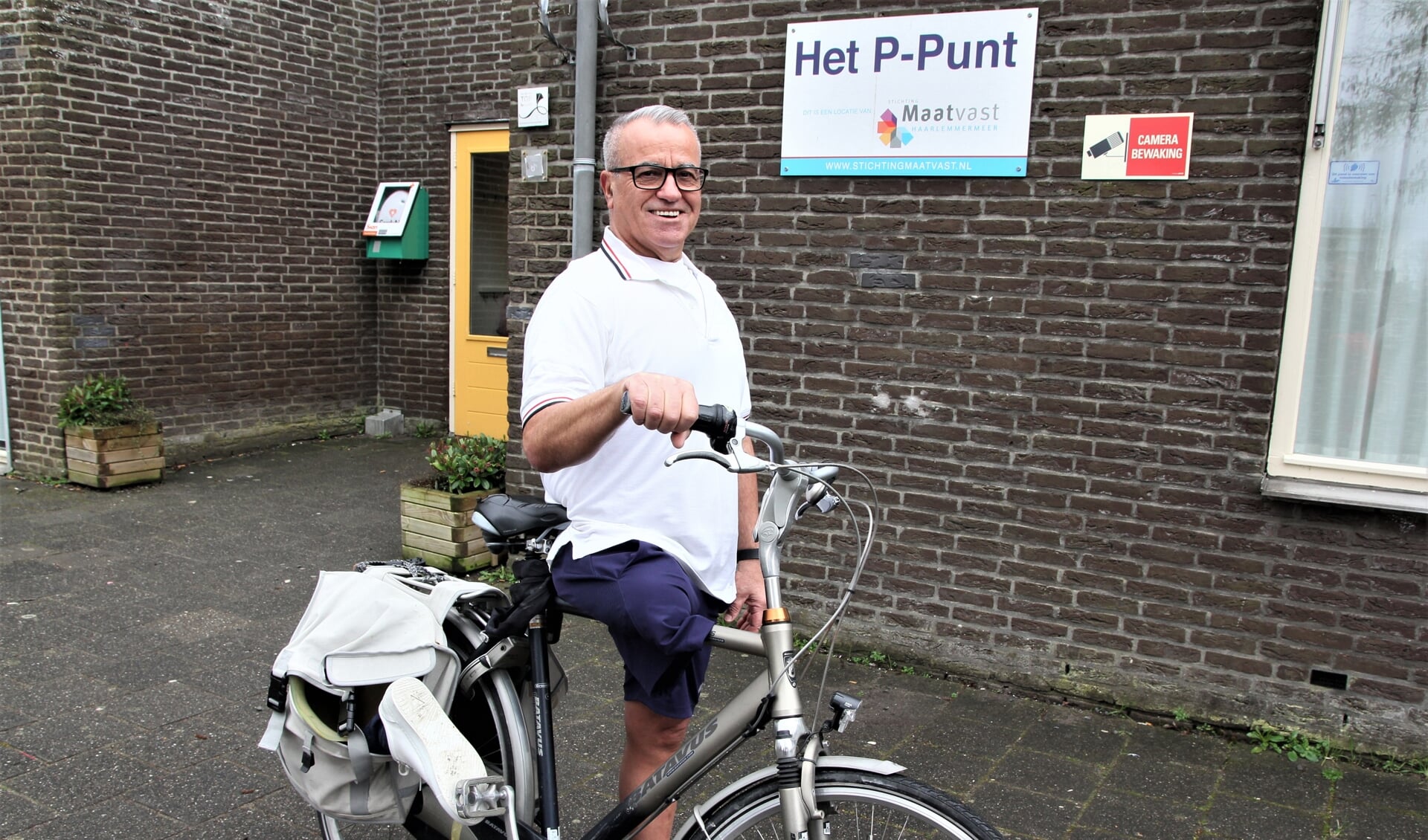 George bij het P-Punt in Graan voor Visch waar hij fietsles geeft.