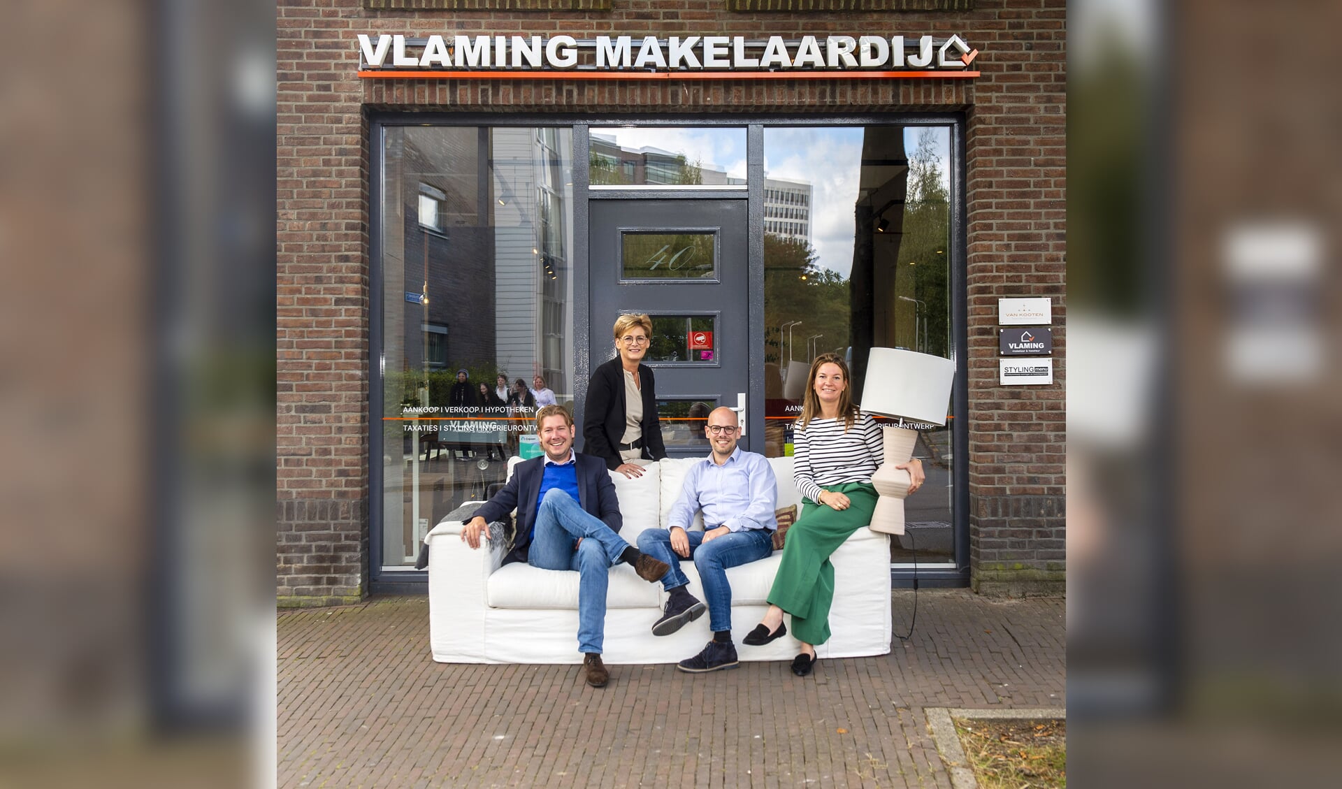 Sjoerd en zijn collega's Willeke, Timo en Marlouk van Vlaming Makelaardij.