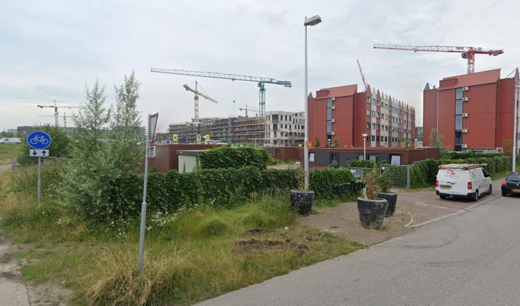 Skaeve Huse in Utrecht/Leidsche Rijn, onopvallend achter een heg. 