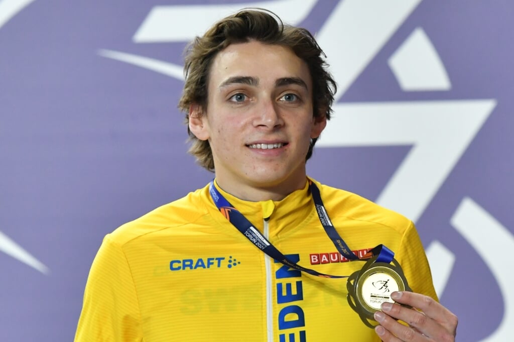 2021-03-07 00:00:00 epa09060087 Gold medalist Armand Duplantis of Sweden poses for a photo during the medal ceremony in the men's pole vault the 36th European Athletics Indoor Championships at the Arena Torun, in Torun, north-central Poland, 07 March 2021.  EPA/Adam Warzawa POLAND OUT