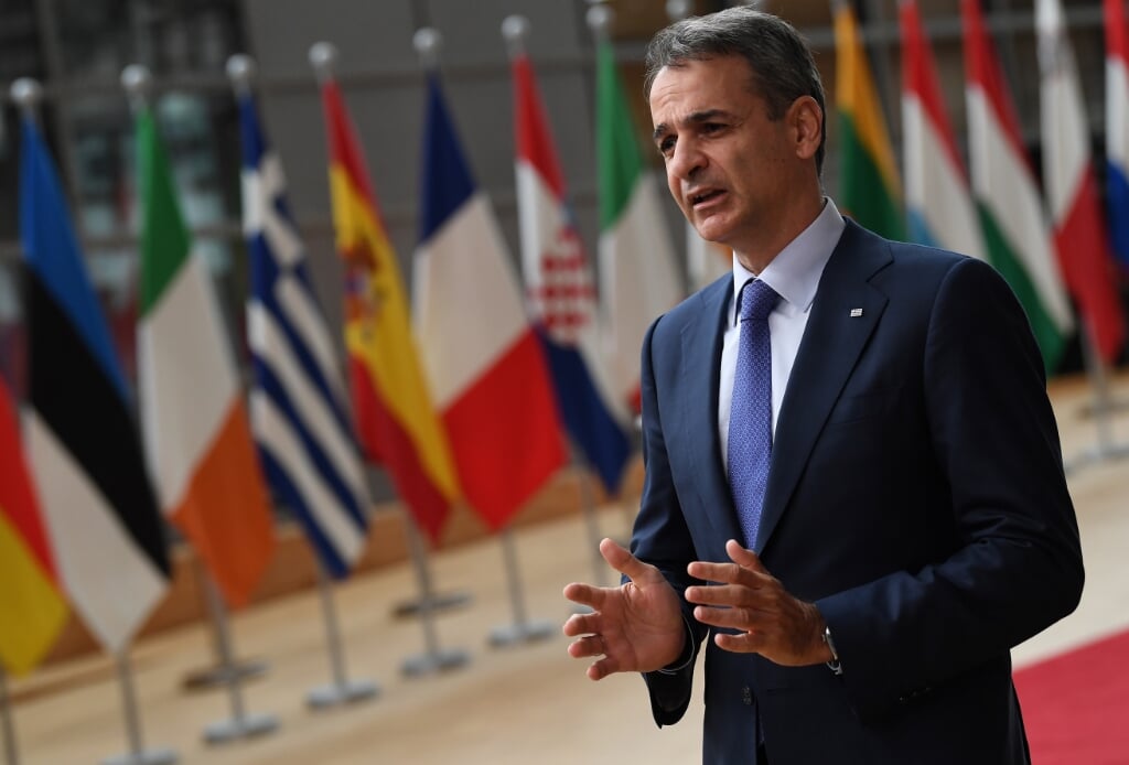2021-06-24 12:29:07 epa09298255 Greece's Prime Minister Kyriakos Mitsotakis addresses media representatives as he arrives on the first day of a European Union (EU) summit at the European Council Building in Brussels, Belgium, 24 June 2021. EU leaders meet in Brussels for two days to discuss COVID-19, economic recovery, migration and external relations.  EPA/JOHN THYS / POOL