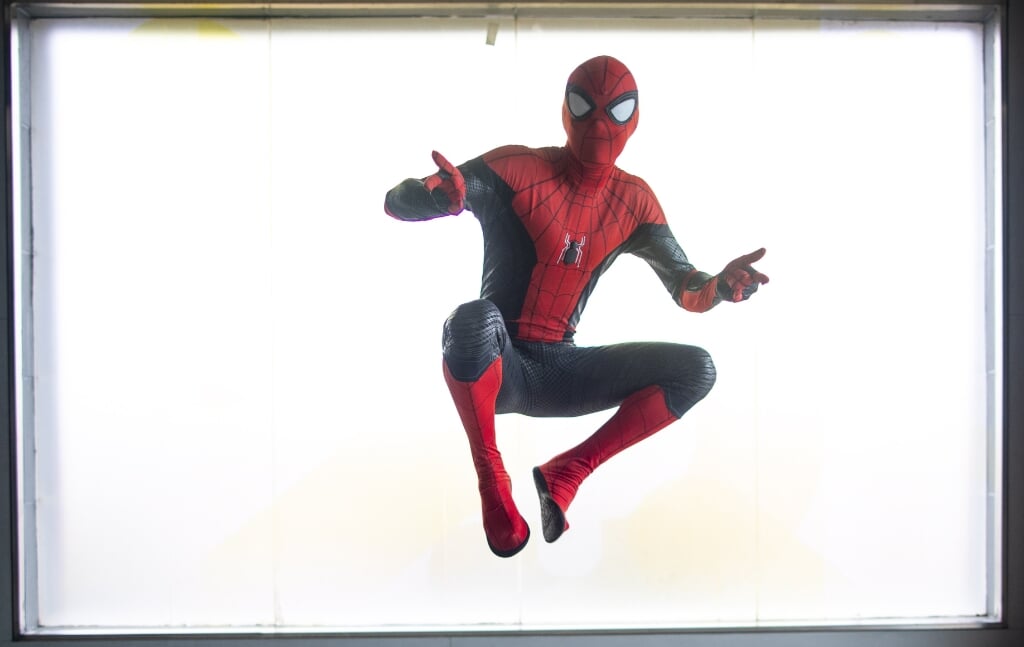 2019-07-11 15:26:15 epa07709959 A man wearing a Spiderman costume attends a screening of the movie 'Spider-Man: Far From Home' at the QFX Cinemas at Labim Mall in Lalitpur, Nepal, 11 July 2019. Apple Entertainment, the movie's official distributor in Nepal, brought in the Spider-Man performer for promotional purposes. 'Spider-Man: Far From Home' was released in Nepalese theaters on 05 July.  EPA/NARENDRA SHRESTHA