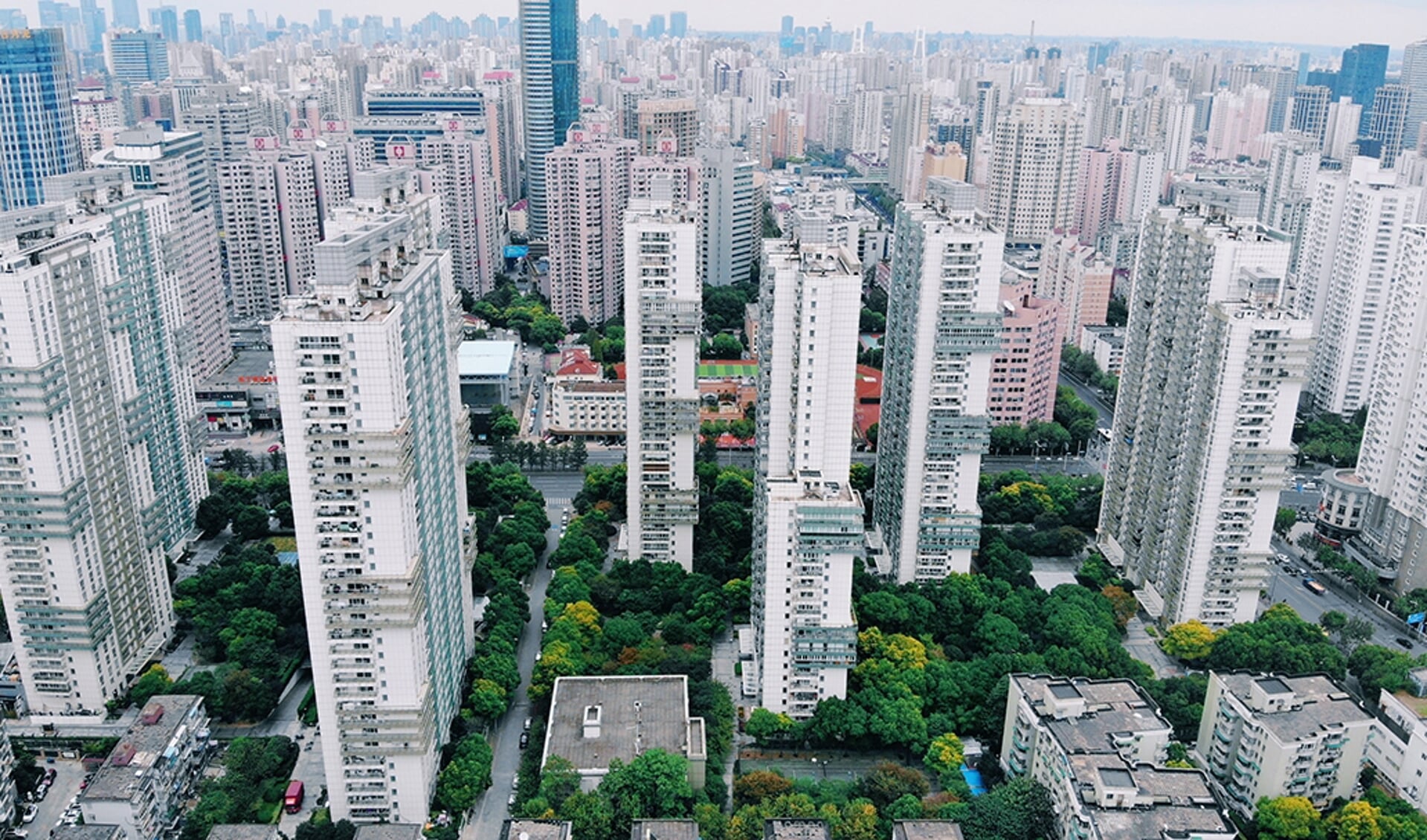 Suburbane huizen met tuinen bestaan niet in China
