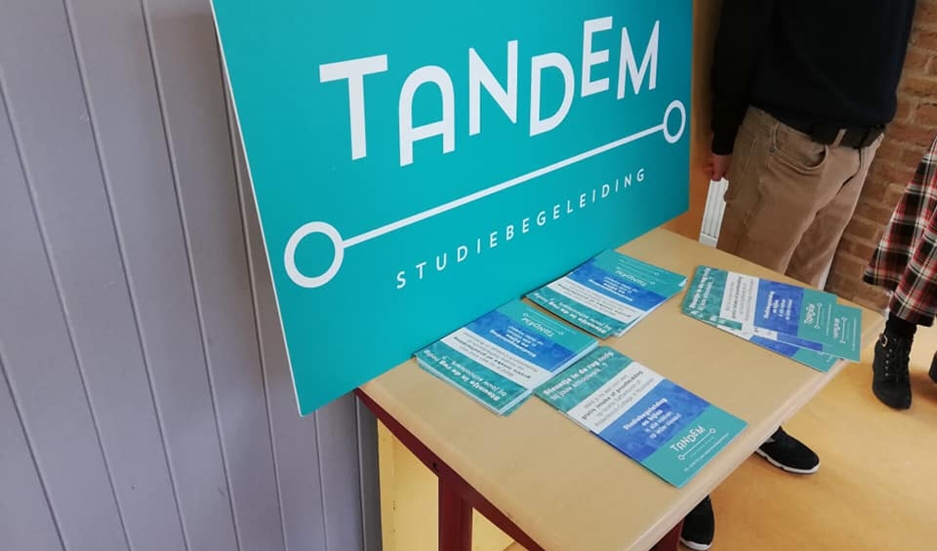 Het logo van Tandem.