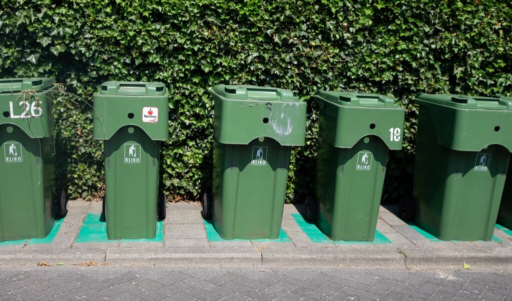 In groenbakken verdwijnt veel plastic. Dat komt via compost in de tuinen terecht. (beeld anp / Harold Versteeg)