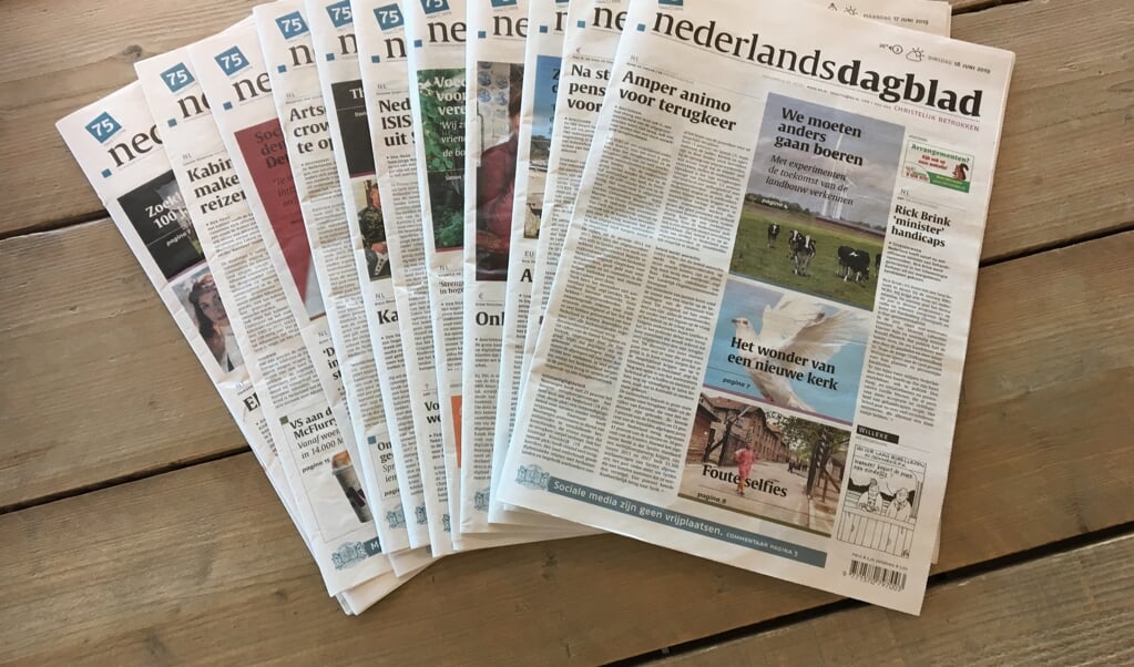 Advertentieverkoop en redactie zijn gescheiden. het Nederlands Dagblad bij haar 75-jarig jubileum. (beeld nd)