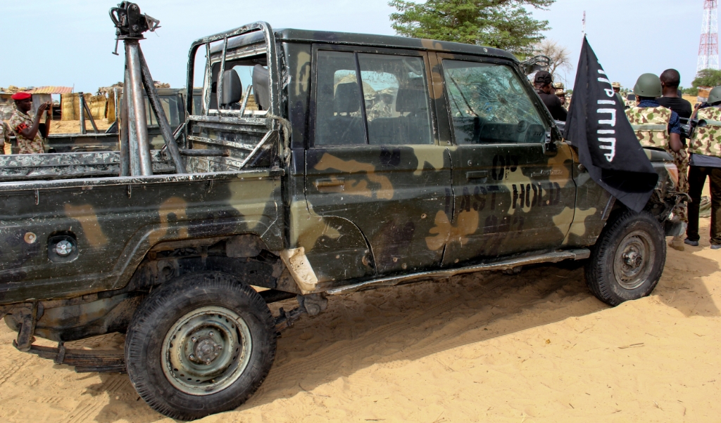 ISIS heeft in Nigeria elf christenen gedood. Op de foto een auto van ISIS in de Nigeriaanse plaats Baga. (beeld afp / Audu Marte )
