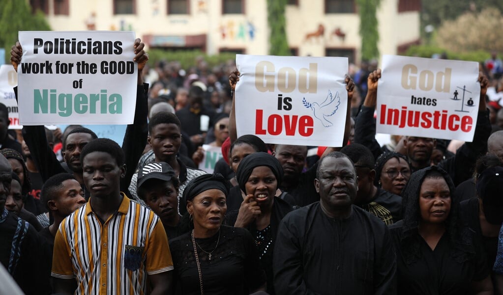Vorig jaar maart gingen christenen in de Nigeriaanse hoofdstad massaal de straat op tijdens een door de katholieke bisschoppen afgekondigde dag van vasten en gebed voor de veiligheid in het land en de door de terroristenorganisatie Boko Haram uitgevoerde moorden en de ontvoeringen.   (beeld afp / Kola Sulaimon)