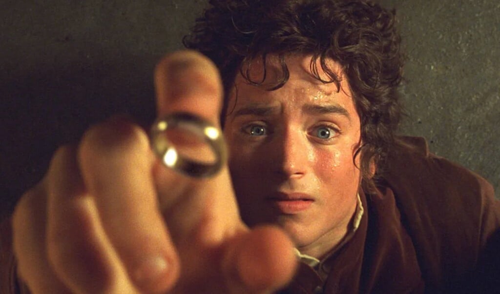 Frodo in de verfilming van de Lord of the Rings-trilogie. Zijn reis mag niet worden misbruikt voor een cryptomunt, heeft de rechter geoordeeld.  (beeld new line cinema)