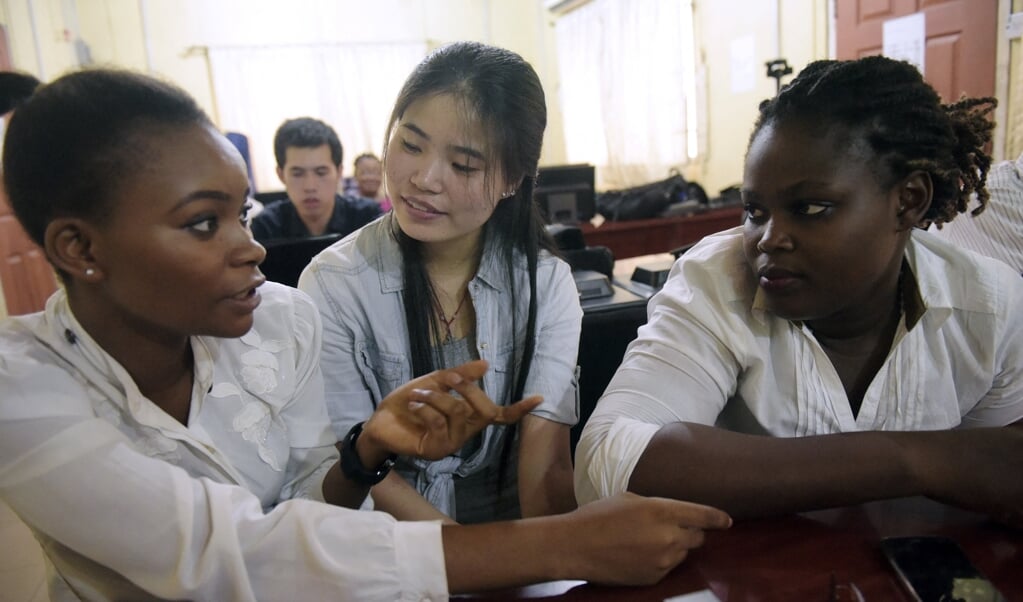 De instituten zijn overal. Hier studenten aan het Confucius Instituut van Lagos. (beeld afp / Utomi Ekpei)