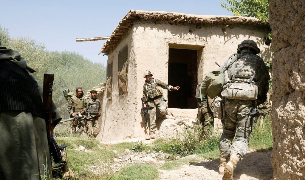Het OMLT (operational mentoring & liason team) ziet toe op de training en inzetbaarheid van de ANA (Afghan national army) en treedt met name op in de beruchte groene zone, het bolwerk van de vijand: taliba (beeld Gerben van Es)