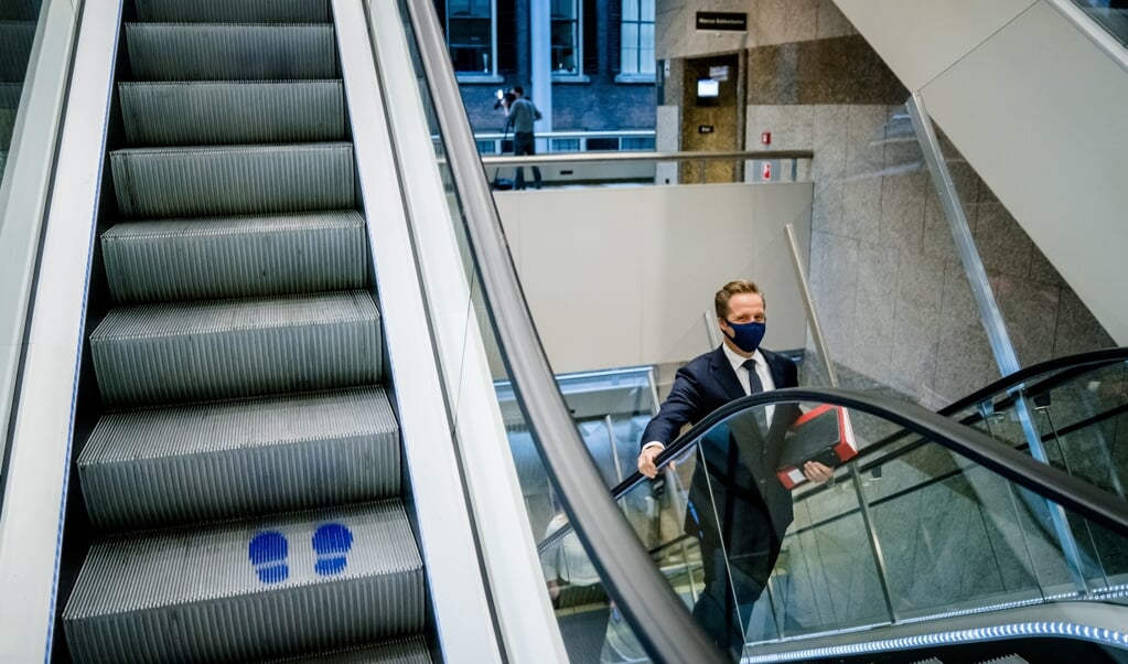 Demissionair Minister Hugo de Jonge van Volksgezondheid, Welzijn en Sport (CDA) in de Tweede Kamer tijdens een debat over de ontwikkelingen rondom het coronavirus. (beeld anp / Bart Maat)