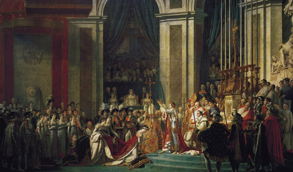 Kroning van keizer Napoleon op 2 december 1804 in de Notre-Dame van Parijs. De kroning vond plaats in aanwezigheid van paus Pius VII. Schilderij van Jacques-Louis David. (beeld wikipedia / Jacques-Louis David)