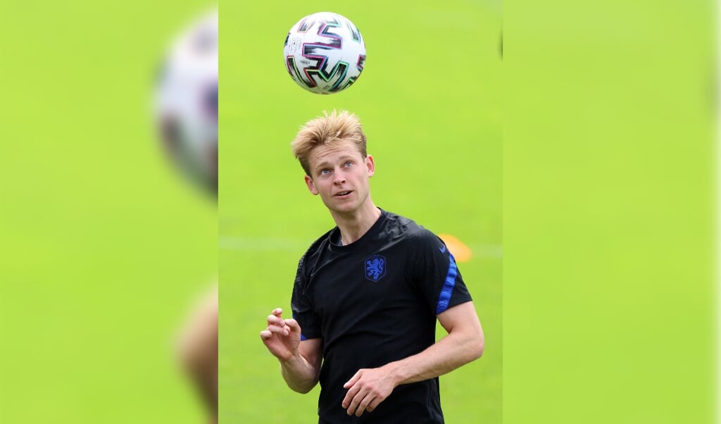 Het ultieme voorbeeld van plezier uitstralen: voetballer Frenkie de Jong. (beeld afp / Kenzo Tribouillard)