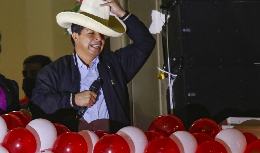 2021-07-24 22:42:20 Peruvian President-elect Pedro Castillo gestures during a celebration at the Peru Libre headquarters, following the ceremony in which he received his credentials for the 2021-2026 period in Lima, on July 23, 2021. Castillo said he is going to copy foreign