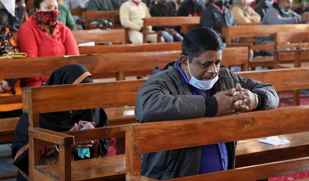 Kerkgangers in Jammu, dicht bij de grens met Pakistan. Christenen in India lijden onder haat die door hindoenationalisten wordt aangewakkerd. (beeld epa / Jaipal Singh)