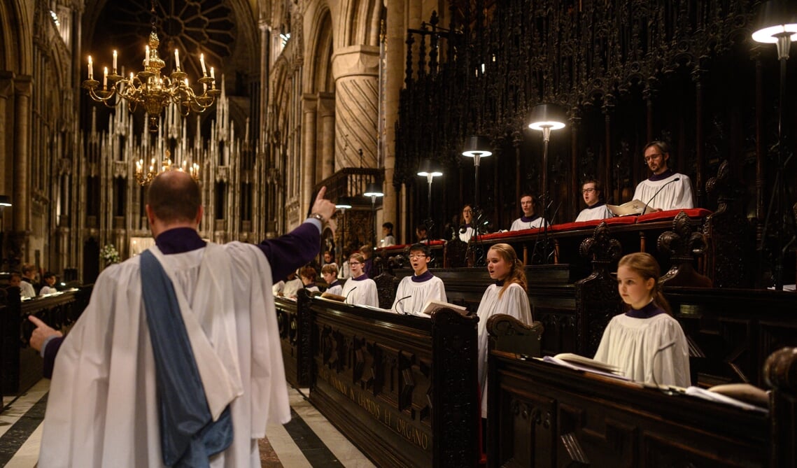 Het koor van de kathedraal van Durham, in Noord-Engeland, oefent voor een ‘Festival of Lessons and Carols’ op kerstavond.