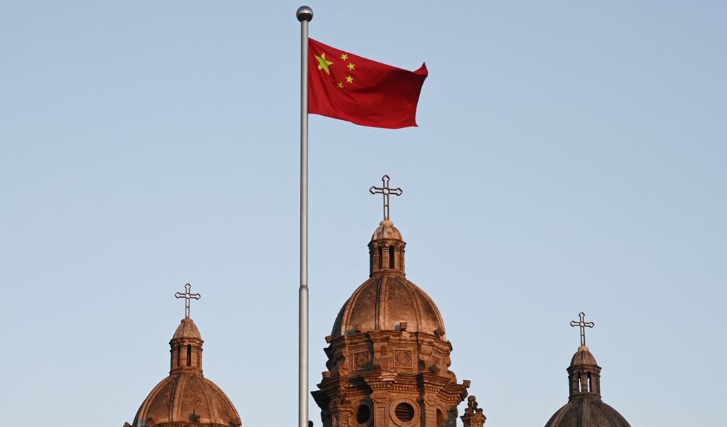 Kerkleiders in China worden gedwongen zich tijdens de Olympische Spelen stil te houden over politiek gevoelige zaken, schrijft Open Doors.  (beeld Greg Baker / afp)