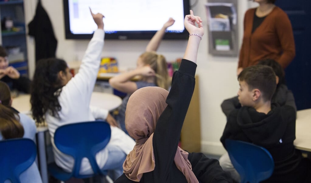 De Utrechtse onderzoekers krijgen 'hele enthousiaste' reacties van docenten die dankzij de lesbrief de vragen van hun leerlingen kunnen beantwoorden. (beeld anp / Arie Kievit)