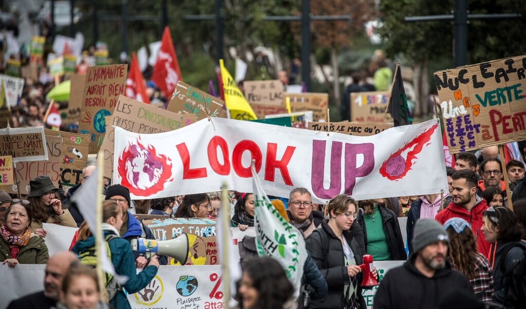 Wereldwijd wordt aandacht gevraagd voor het klimaatprobleem, zoals hier in Toulouse, vorige maand.   (beeld afp / Fred Scheiber)