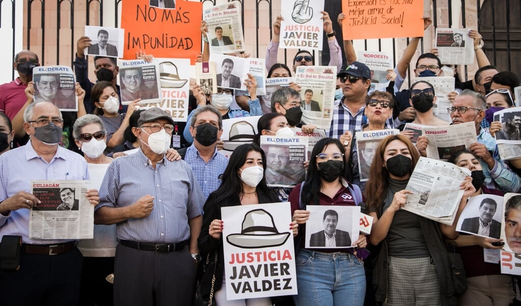 Tijdens een demonstratie eisen inwoners van Mexico gerechtigheid voor het grote aantal vermoorde journalisten dit jaar.  (beeld afp / Jesus Verdugo)
