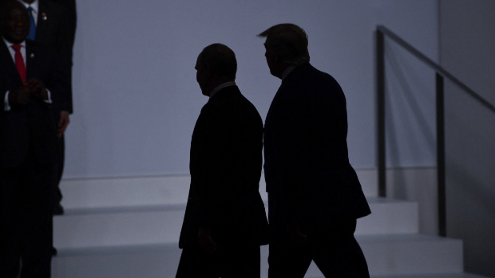 Poetin en Trump bij een G20-top in Osaka in 2019