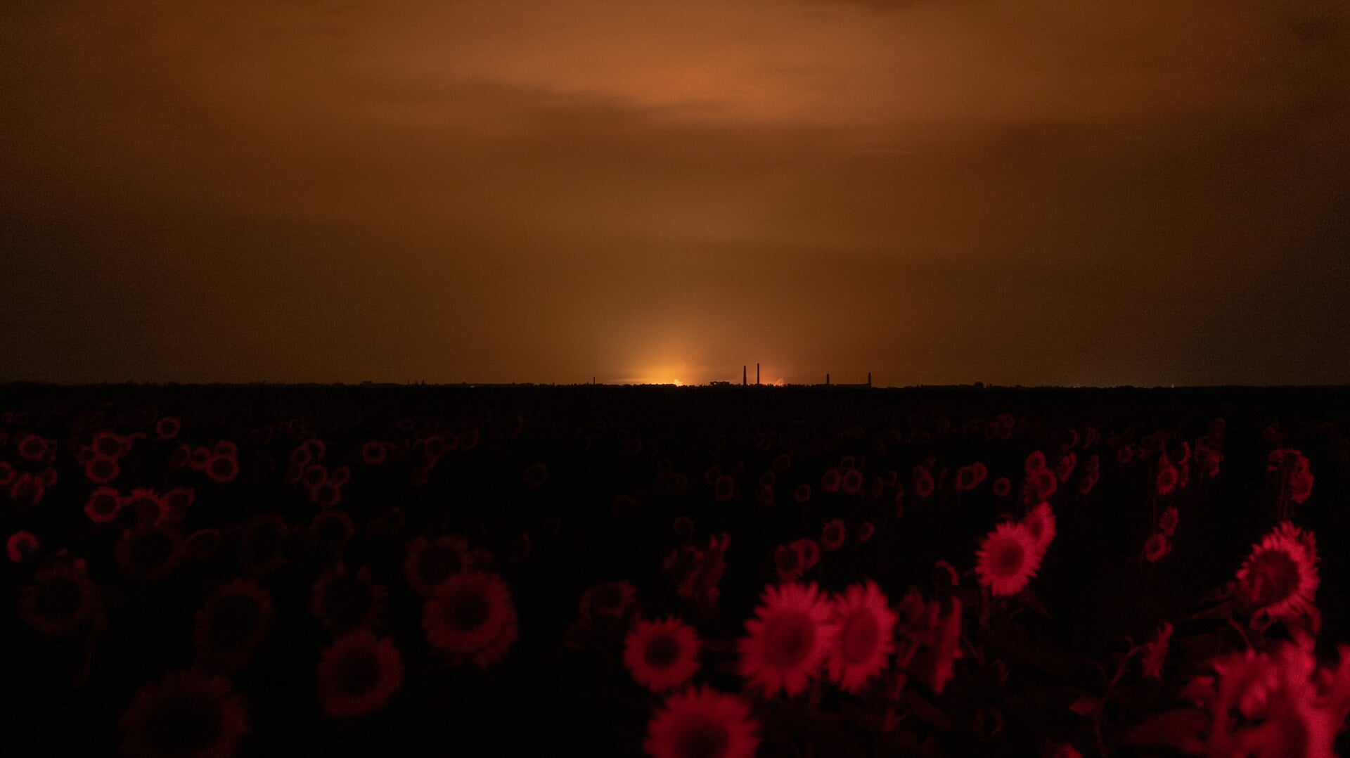 Explosies in de verte in de Oost-Oekraïense stad Pavlograd, op 19 juli 2025.