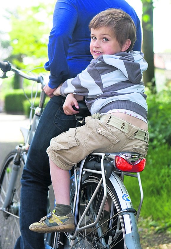 Per dag acht kindervoeten tussen de spaken (anp / Koen Suyk)
