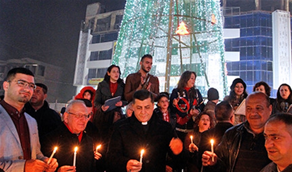 Kardinaal Sako (midden) bij eerdere kerstactiviteiten in Bagdad. (afp / Sabah Arar)