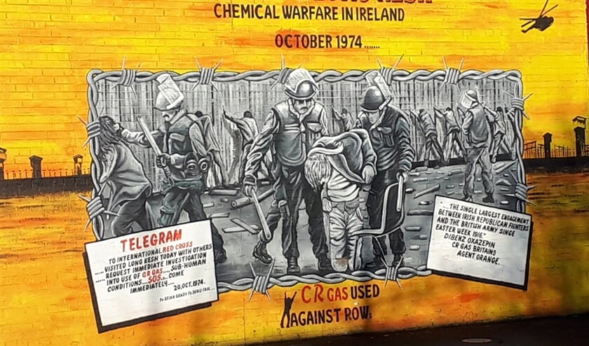Propagandistische muurschilderingen in Belfast houden de herinneringen aan de Troubles levend.