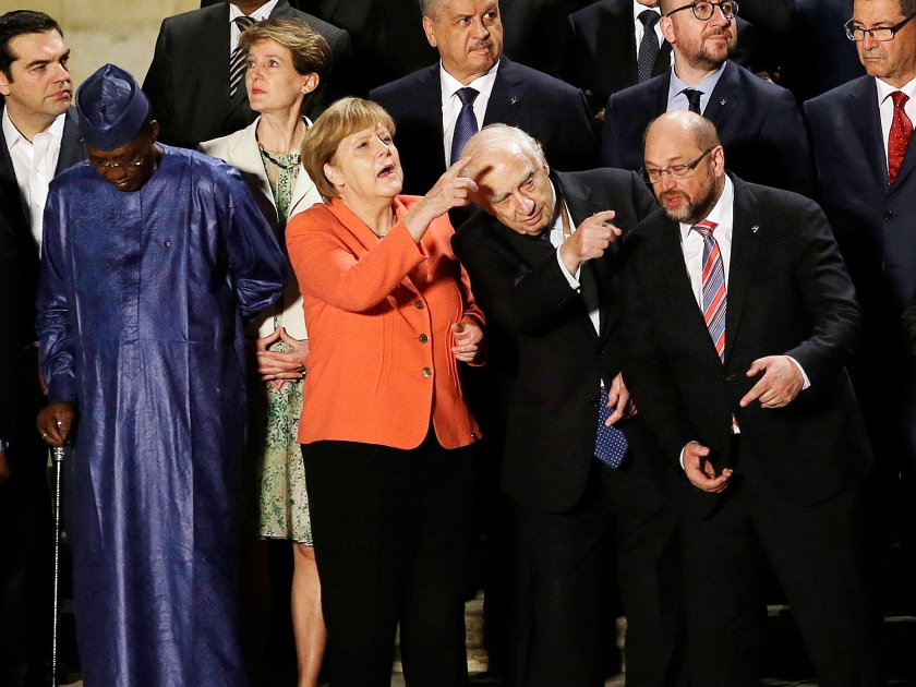 German Chancellor Angela Merkel, center, flanked by Special Representative of the UN Secretary-General for Migration and Development Peter Sutherland, second from right, and by European Parliament President Martin Schultz, attend with EU and African leaders the opening ceremony of a summit on migration at the Auberge de Castille palace, the Prime Minister office, in Valletta, Malta, Wednesday, Nov. 11, 2015. (AP Photo/Antonio Calanni) (ap)