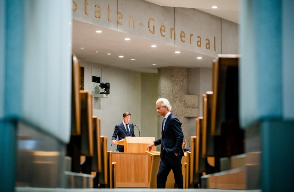 2021-09-23 12:41:58 DEN HAAG - Demissionair premier Mark Rutte en Geert Wilders (PVV) tijdens de tweede dag van de Algemene Politieke Beschouwingen, het debat na de Troonrede op Prinsjesdag. Na de reactie van de Tweede Kamer op de begroting die op Prinsjesdag door het demissionaire kabinet is gepresenteerd, was het de beurt aan Rutte om te reageren. ANP BART MAAT (beeld anp / Bart Maat)