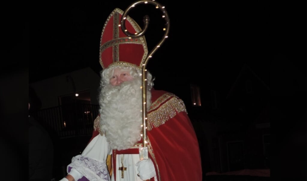 Sinterklaas met verlichte staf