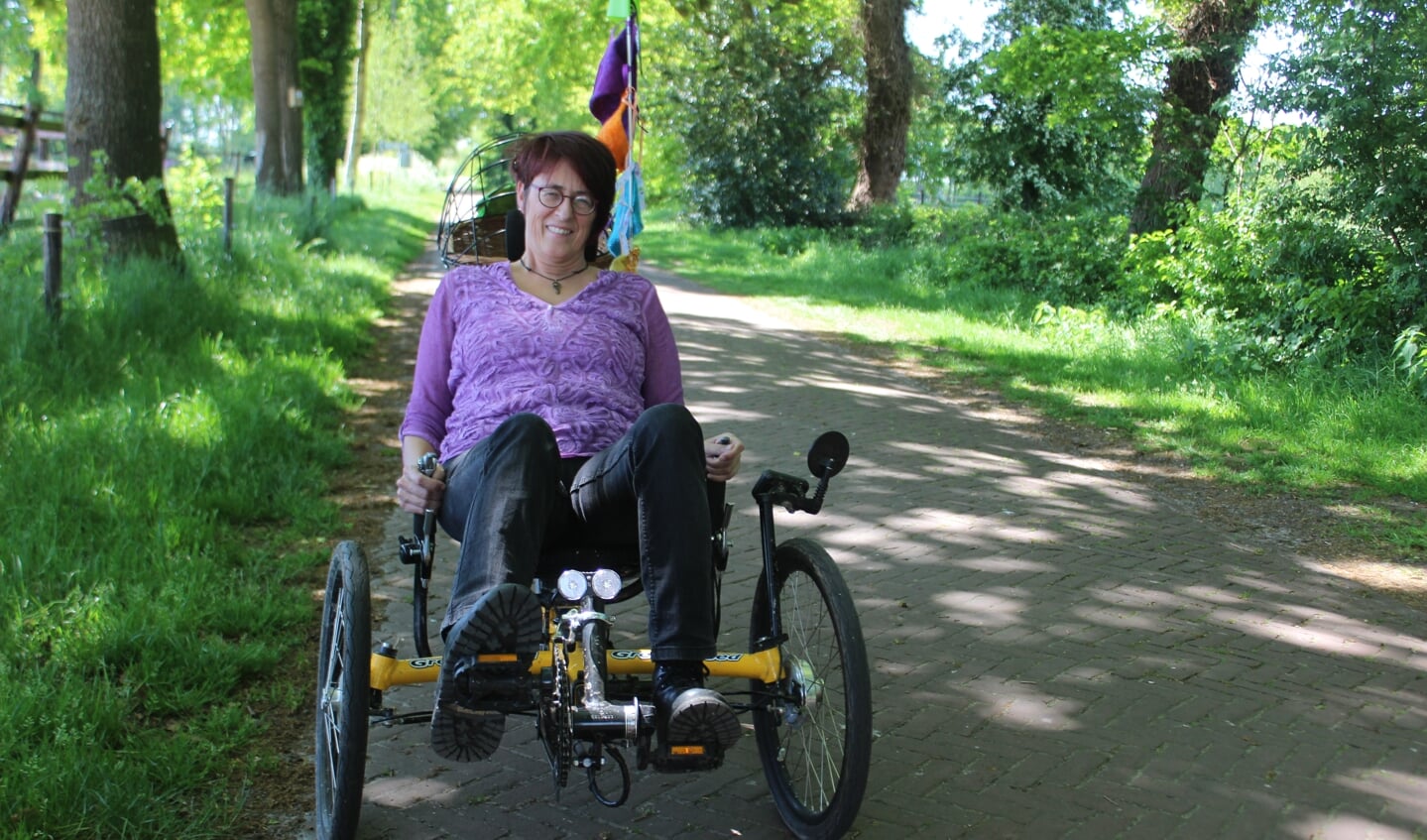 Mirjam van der Houwen: ,Als inwoners mij zien op mijn gele fiets weten ze nu waar ik voor train." 