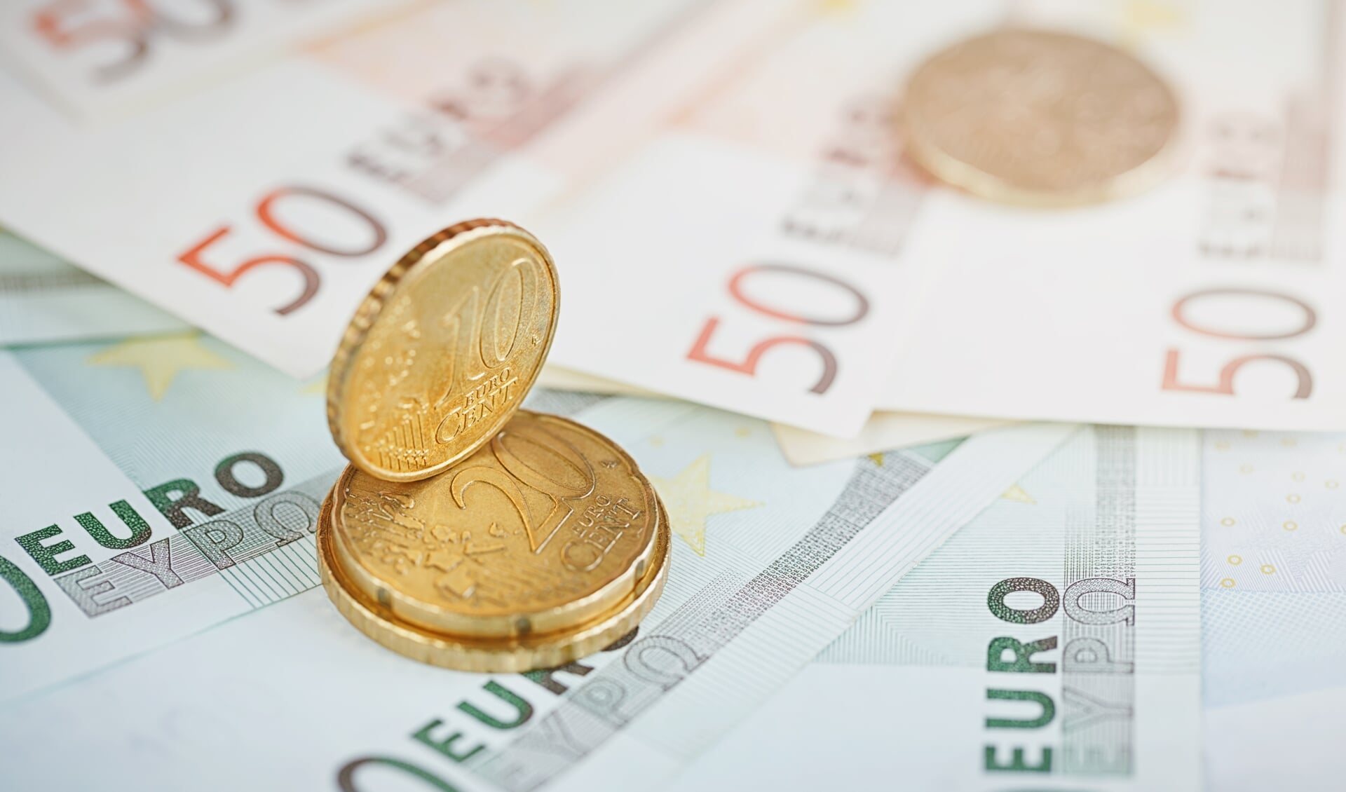 Euro money: closeup of banknotes and coins. Financial concept