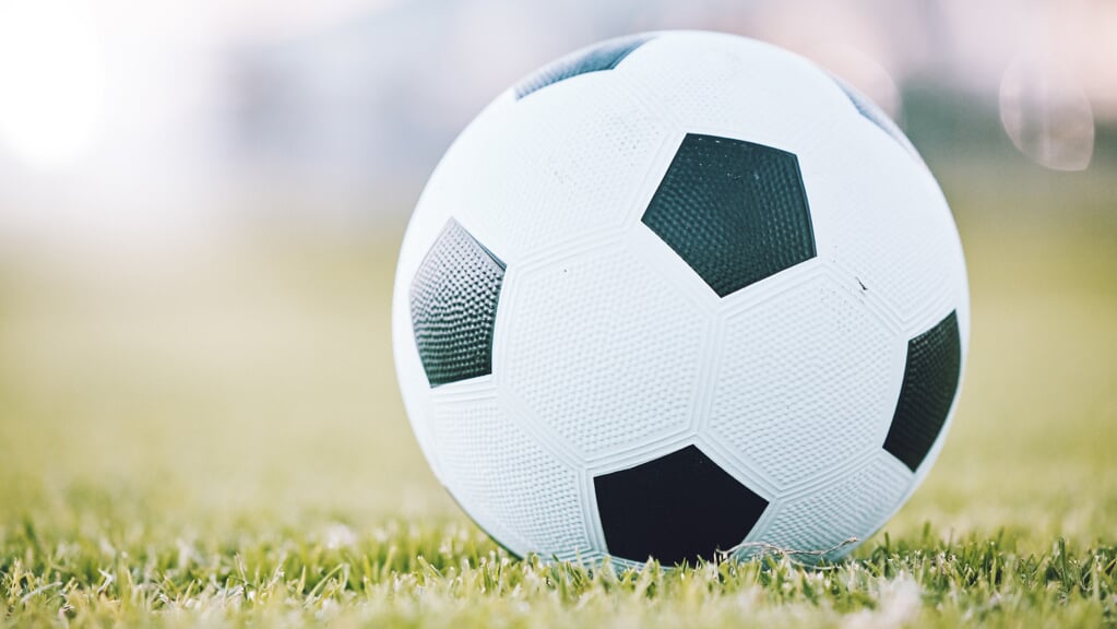 Soccer, ball and field ready for kickoff, game time or match start in sports, athletics or tourname.
