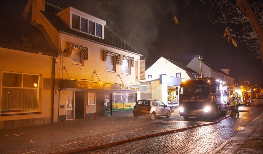 Brandweer rukte uit na brand in wasdroger bij restaurant aan Dorpsstraat Halsteren. 