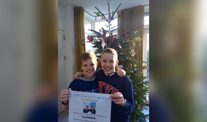 Teun (links) en Yannick met het opgehaalde bedrag.