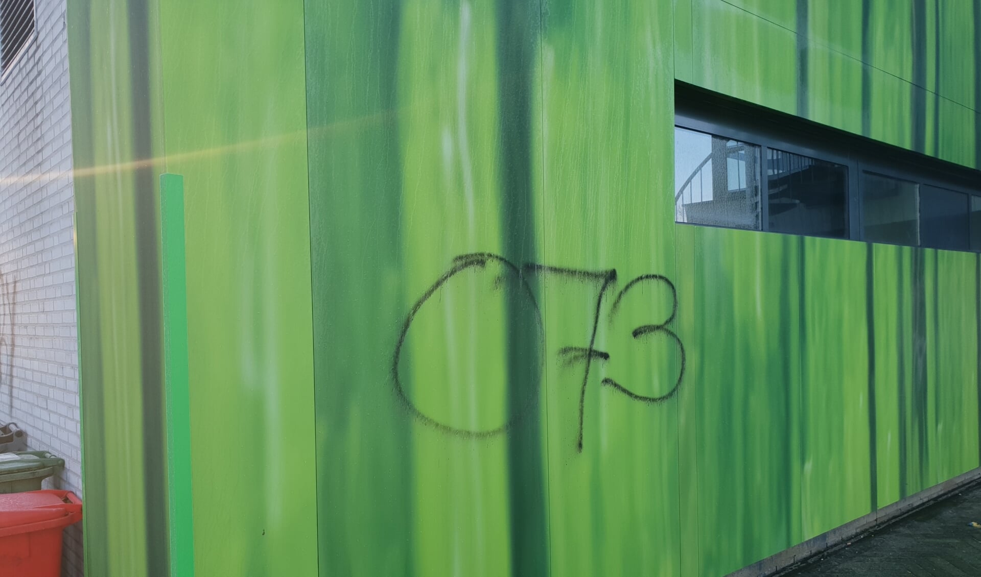 Graffiti op het stadion van TOP Oss.