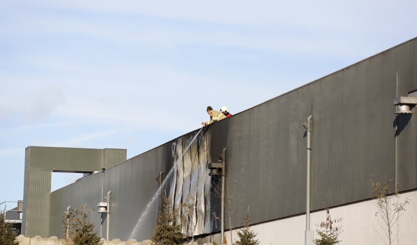 Brand bij bedrijfspand in Wanroij.