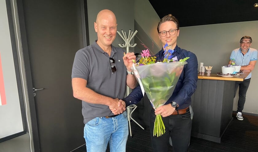 Rob den Dikken met zijn zoon Thijs.