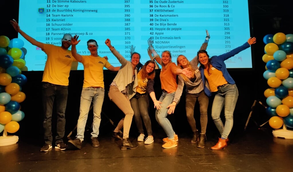 Vrolijke deelnemers tijdens de Dorpskwis.