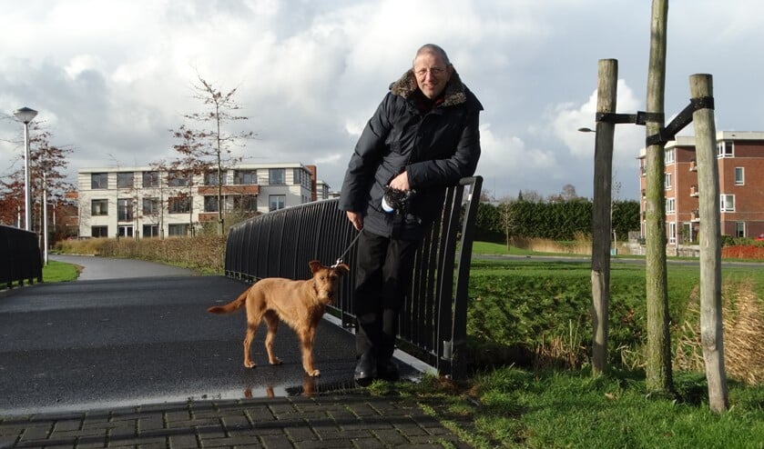 Hans met zijn hond. (Foto: Andrea van der Houwen)