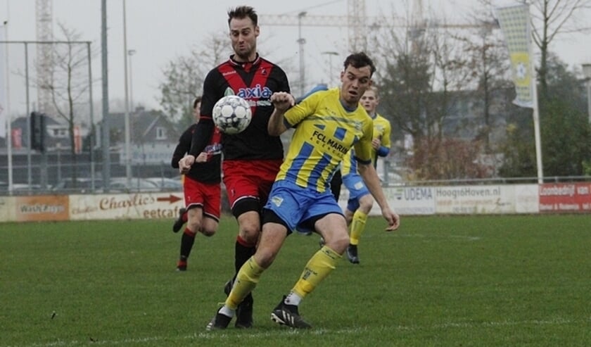 <p>Ook bij cvv Berkel - Vitesse Delft was het stil langs de lijn. De bezoekers wonnen met 2-4. (Foto: Moshe Amsalem)</p>