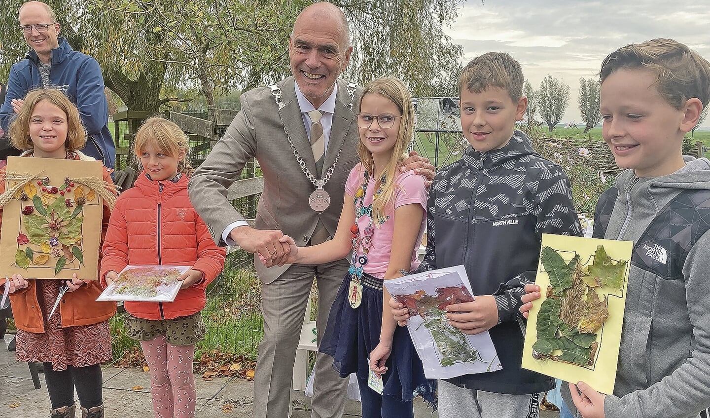 De klimaatraadsleden met de locoburgemeester.