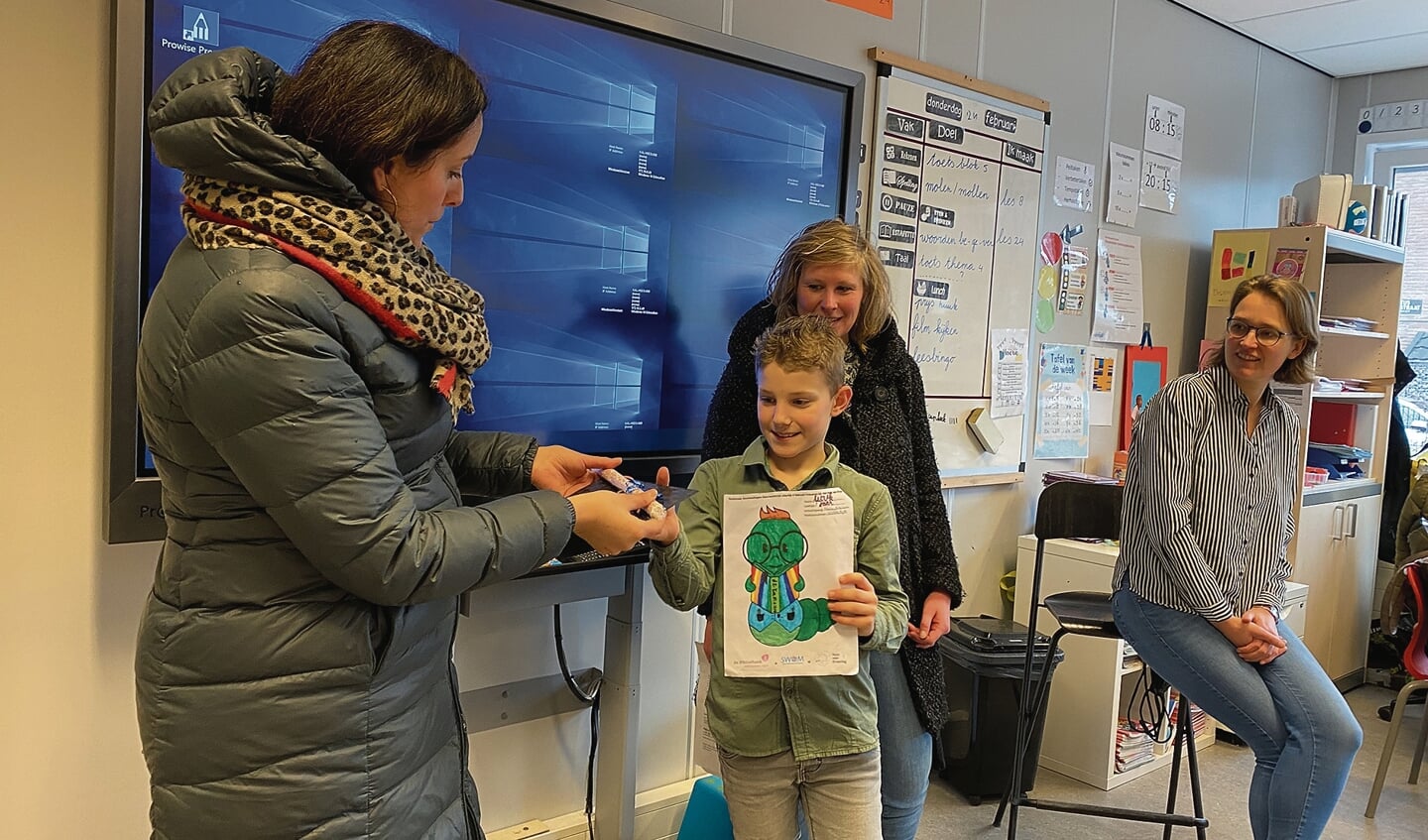 Luuk was erg blij met zijn boekenbon.