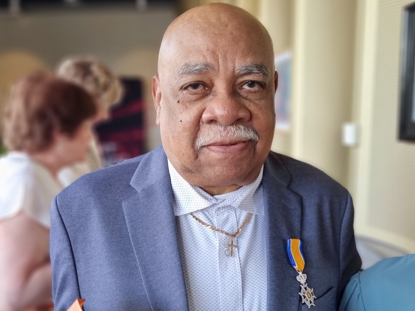 Norman Poulina: Lid in de Orde van Oranje-Nassau.