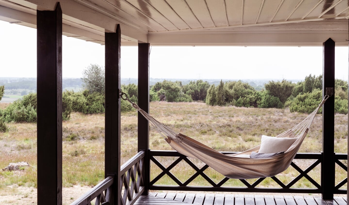 De veranda van het huisje op de Lemelerberg.